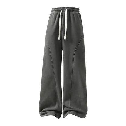 Men's Solid-Color Drawstring Pants with Curved Blade Design - Comfortable and Versatile Trousers for All Seasons and Everyday Layering in Beige.