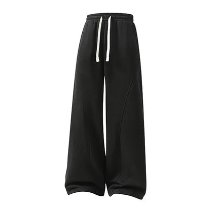 Men's Solid-Color Drawstring Pants with Curved Blade Design - Comfortable and Versatile Trousers for All Seasons and Everyday Layering in Beige.