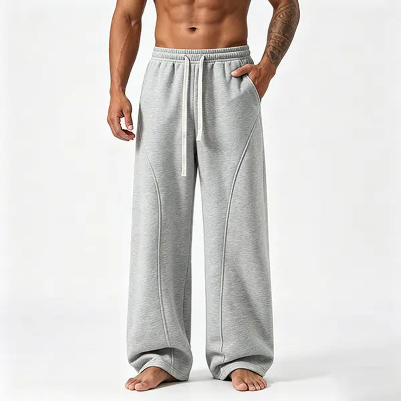 Men's Solid-Color Drawstring Pants with Curved Blade Design - Comfortable and Versatile Trousers for All Seasons and Everyday Layering in Beige.